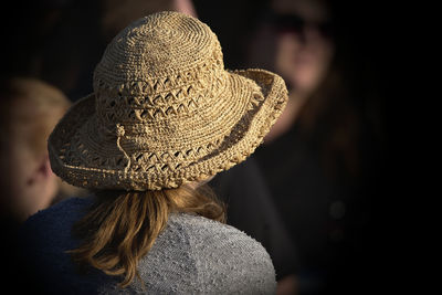 Rear view of woman wearing hat