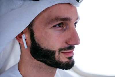 Close-up of young man looking away