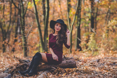 Young woman in forest during autumn