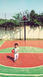 Girl standing in playground