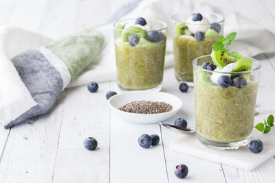 Healthy kiwi chia pudding parfaits, ready for eating.