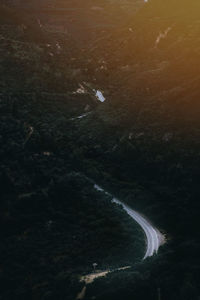 High angle view of winding road on land