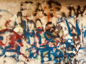 Full frame shot of graffiti on wall