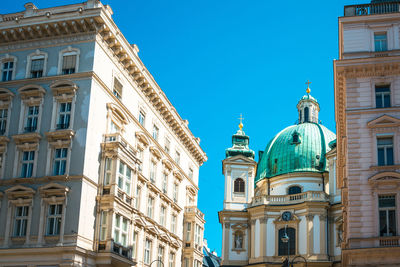 High section of church against blue sky