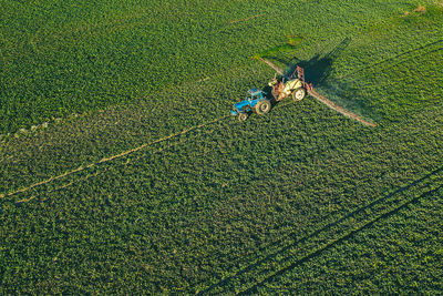Aerial view of combine harvester at farm