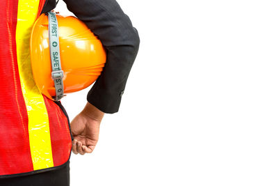 Midsection of man working over white background