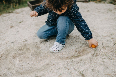 Full length of girl on sand