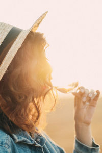 Portrait of woman drinking coffee