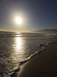 Scenic view of sea against sky at sunset