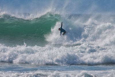 Man surfing in sea