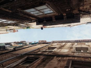 Low angle view of buildings in city against sky