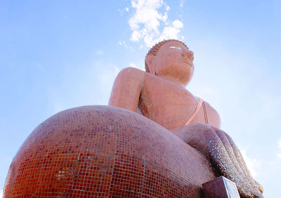 Low angle view of statue against sky