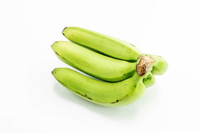 High angle view of green pepper against white background