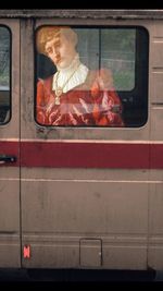 Close-up of man sitting in bus