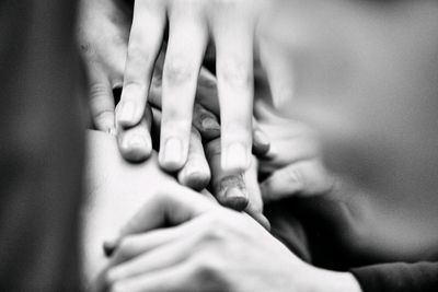 Close-up of hands holding baby