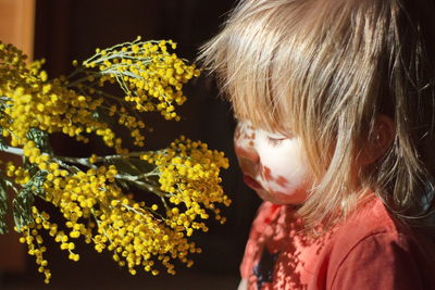 Close-up portrait of girl looking down