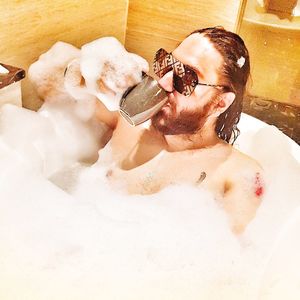 View of man in bathroom at home