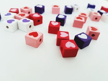 Close-up of toys over white background