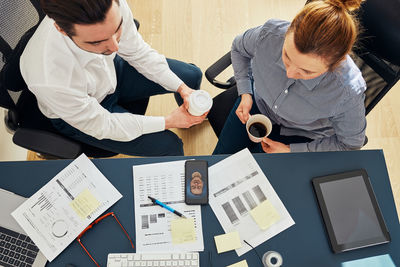 Business people having video call discussing financial data working together in office. co-working