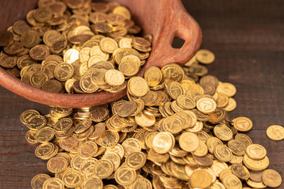 Close-up of coins on table