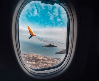 View of sky seen through airplane window