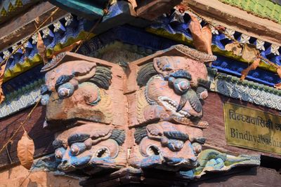 Low angle view of sculptures on temple