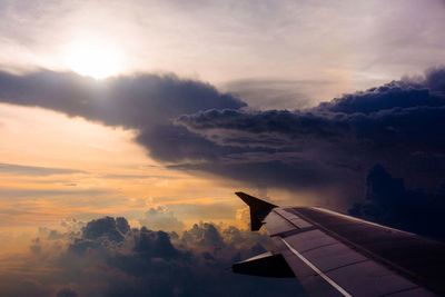 Flight cloud trails of a sunsetting sky - singapore
