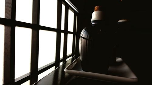 Close-up of glass window on table