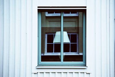 Full frame shot of window on wall of building