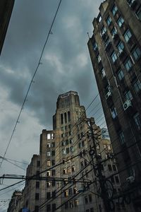 Low angle view of skyscrapers against sky