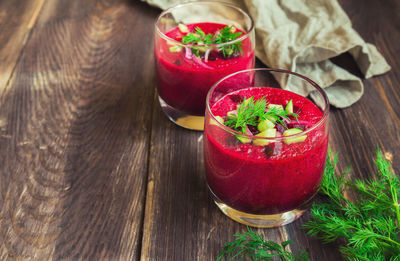 Fruits in glass on table