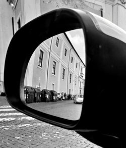 Reflection of building in city street