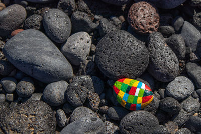 High angle view of stones on pebbles