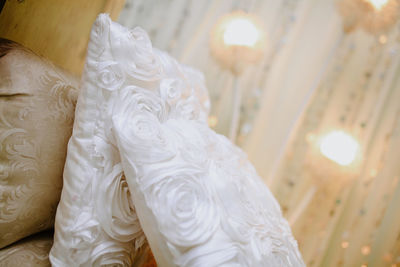 Midsection of woman wearing wedding dress