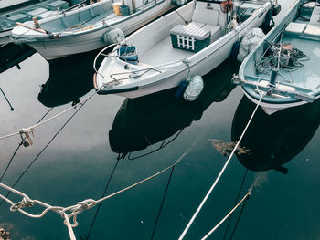 High angle view of boats moored at harbor