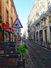 View of road amidst buildings