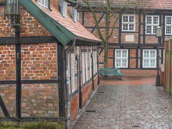 Empty footpath by building