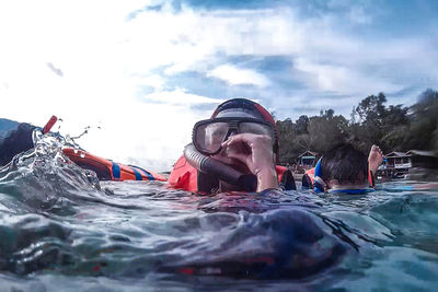 Woman swimming in water