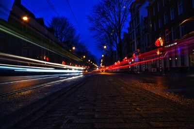 Light trails on city street at night