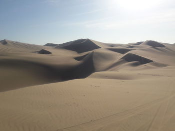 Scenic view of desert against sky