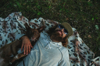 High angle view of dog lying down