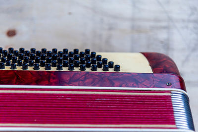 Close-up of piano keys on table