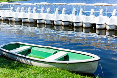 Boats moored in lake