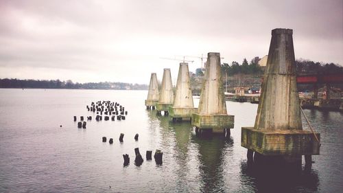 View of wooden post in sea