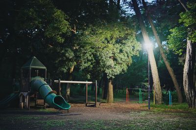 Low section of woman sitting on field