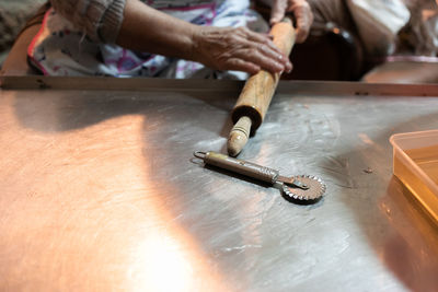 Close-up of man working on table