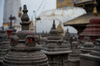 View of temple against building