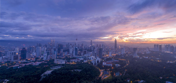 Panoramic view of buildings against sky during sunset
