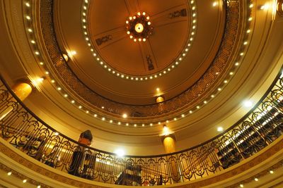 Low angle view of illuminated ceiling