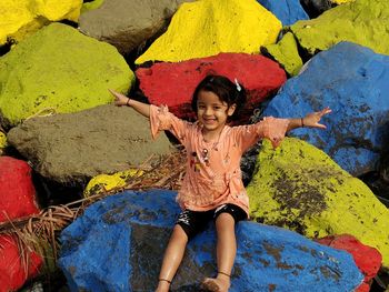 Full length portrait of smiling girl